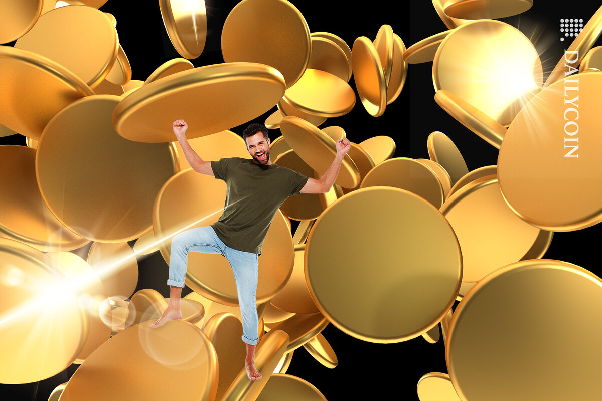 Guy celebrating shiny new coins.