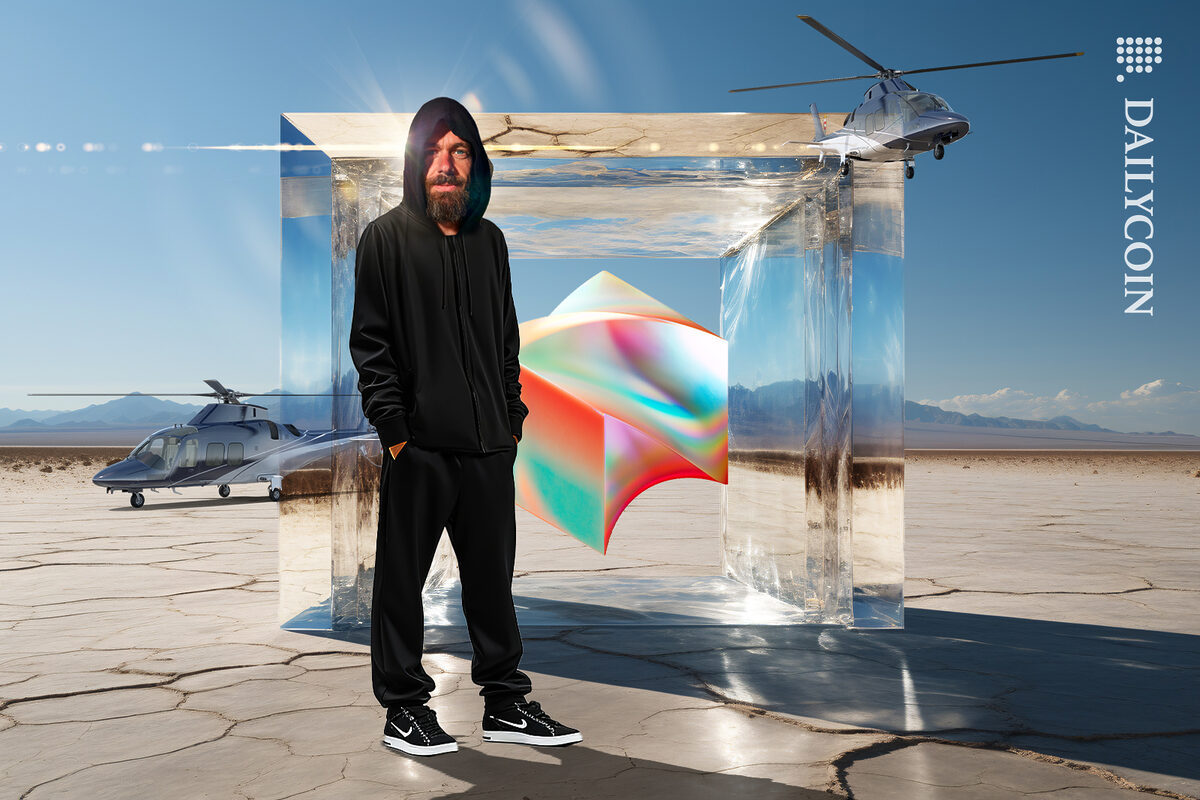 Jack Dorsey on a desert land with his ptotected Block and helicopters are arriving.