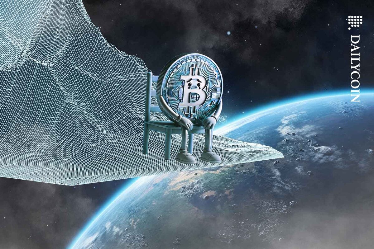 A sad Bitcoin sitting on the edge of a 3D wireframe chart staring down to earth underneath.