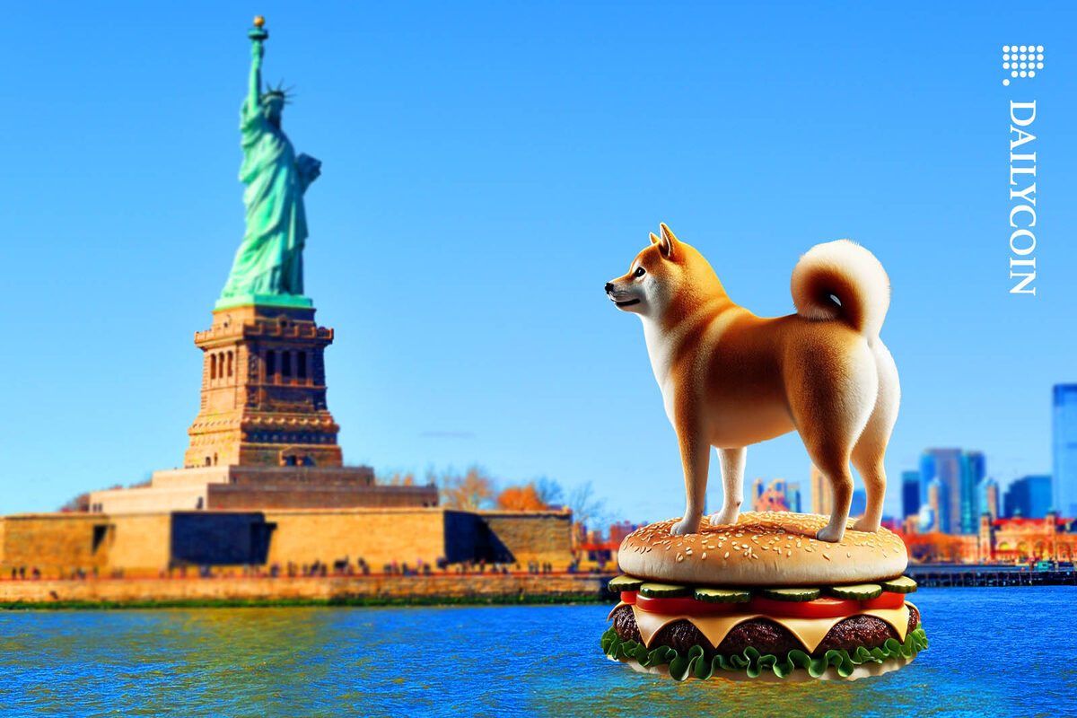 Shiba Inu floating on a cheeseburger towards the Statue of Liberty in New York Harbour.