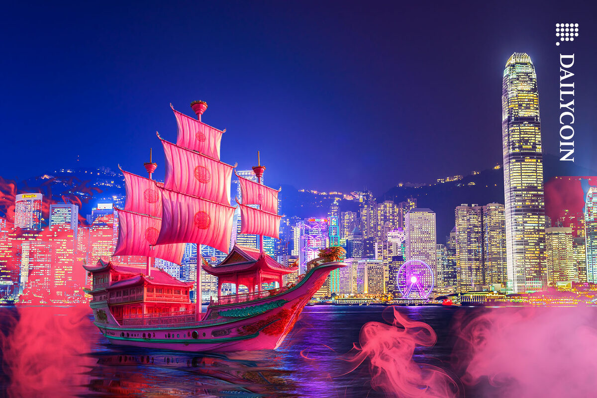 A pink sailing ship anchoring in the harbour of Hong Kong.