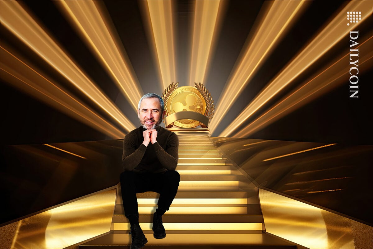 Brad Garlinghouse sitting on the golden steps waiting for his win for Ripple.