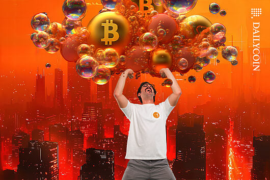 Man with Metaplanet t-shirt holding up a group of bitcoin bubbles above him.