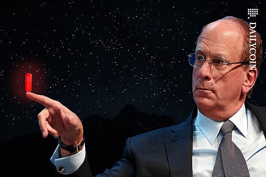 Larry Fink balancing a red pill on his finger.