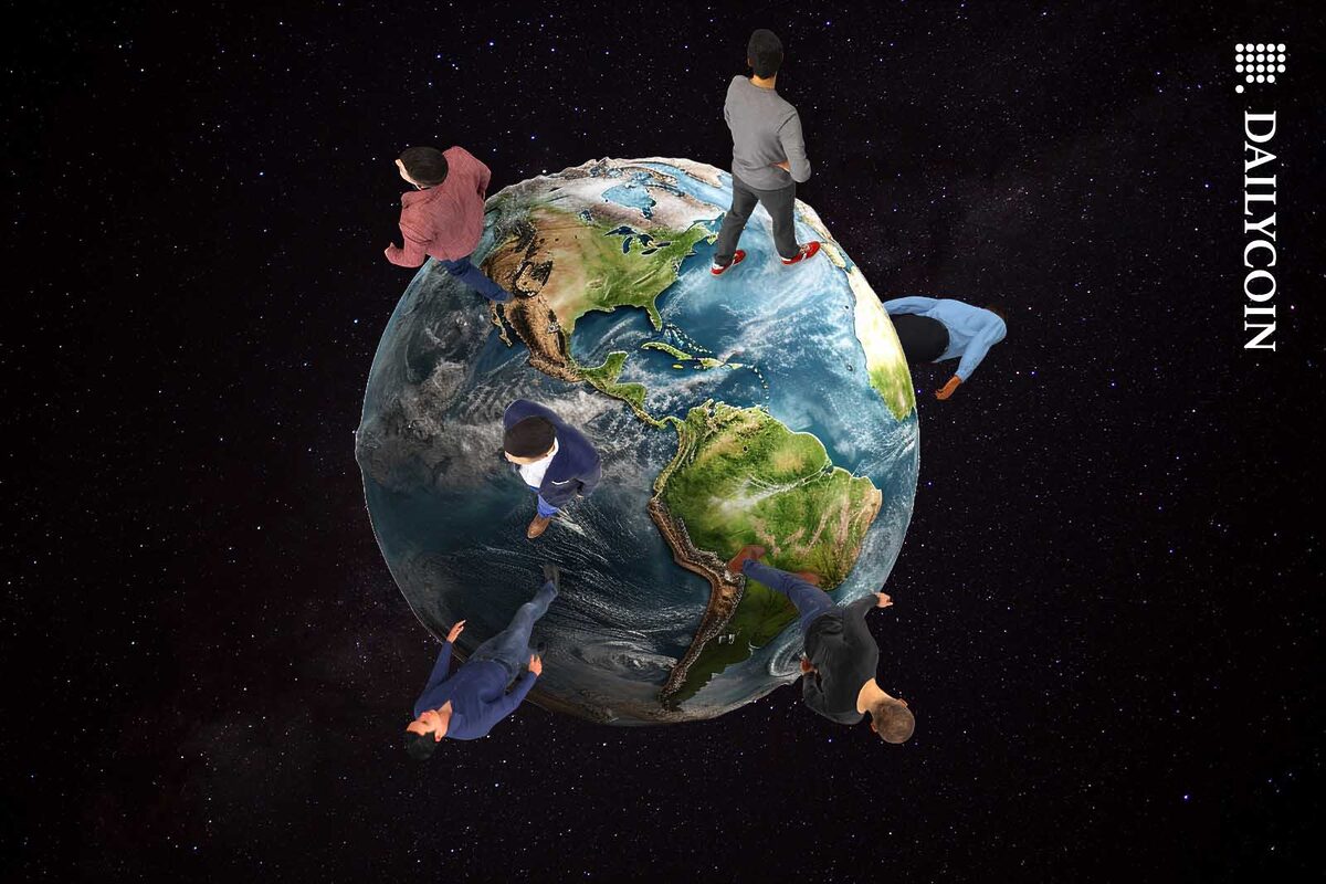 Large people walking around the globe.