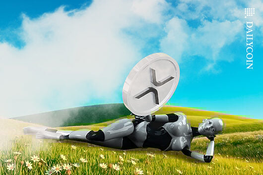 Robot daydreaming holding a massive XRP coin.